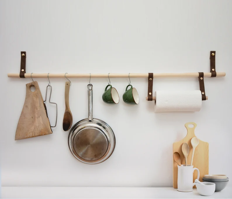 wooden paper towel holder with leather hangs: hanging kitchen roll holder with leather details | paper towel holder ideas